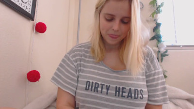 Blonde with huge natural tits in front of the cam